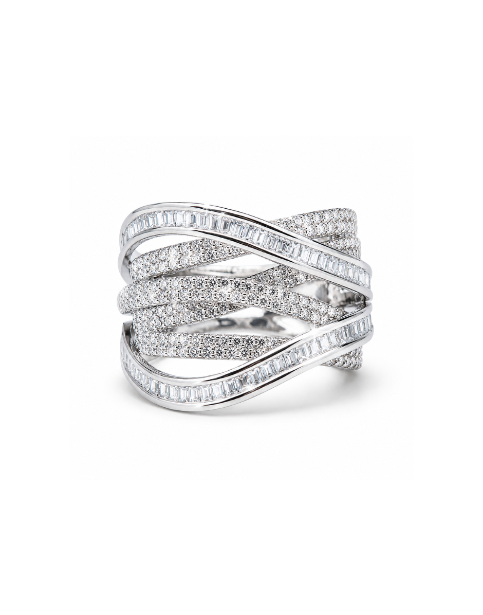 Silver ring with diamond accents on a white background