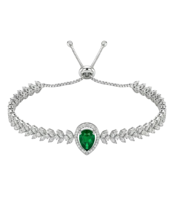 Silver bracelet with a heart-shaped green gemstone on a white background