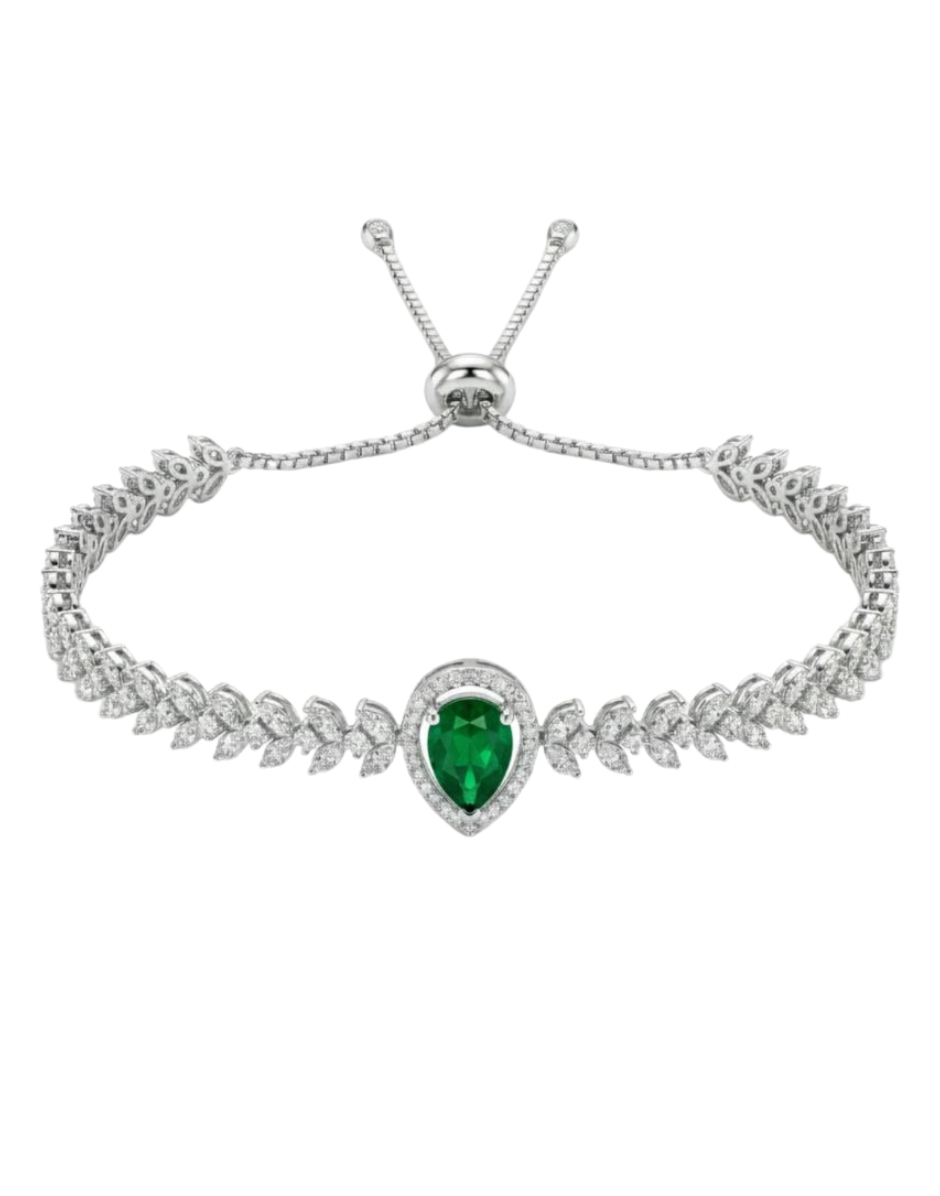 Silver bracelet with a heart-shaped green gemstone on a white background