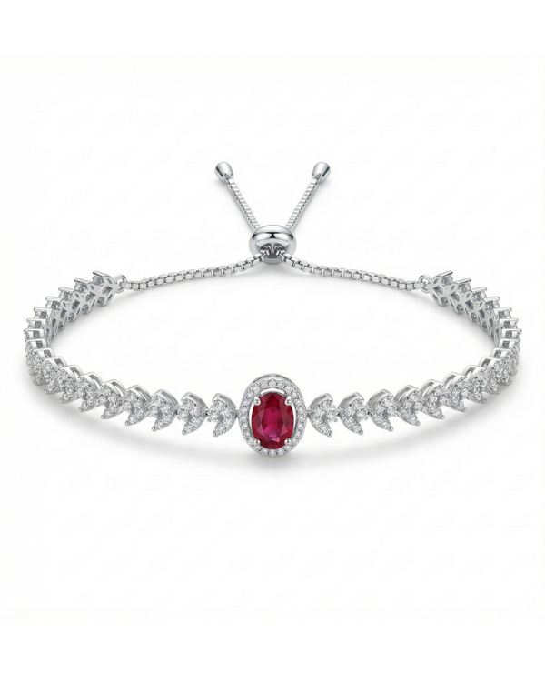 Silver bracelet with a red gemstone on a white background