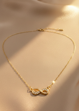 Infinity Pendant Necklace with Zircon Accents (18kt Gold Plated)