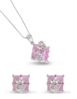 Pink gemstone jewelry set with necklace and earrings on a white background