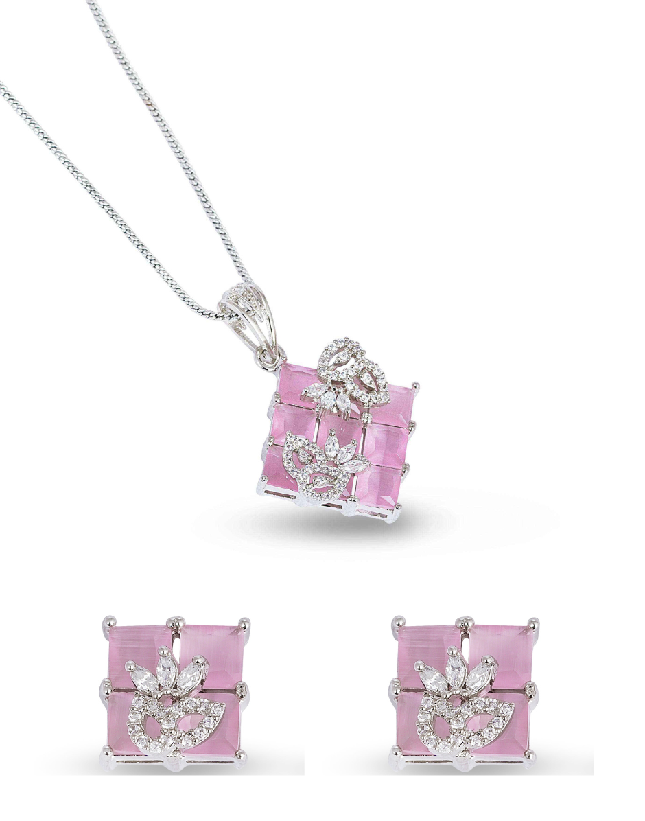 Pink gemstone jewelry set with necklace and earrings on a white background