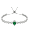 Silver bracelet with a heart-shaped green gemstone on a white background