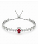 Silver bracelet with a red gemstone on a white background