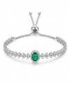Silver bracelet with a green gemstone on a white background