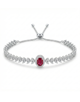 Silver bracelet with a red gemstone on a white background