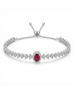 Silver bracelet with a red gemstone on a white background